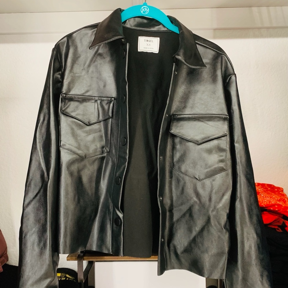Faux leather cropped jacket.